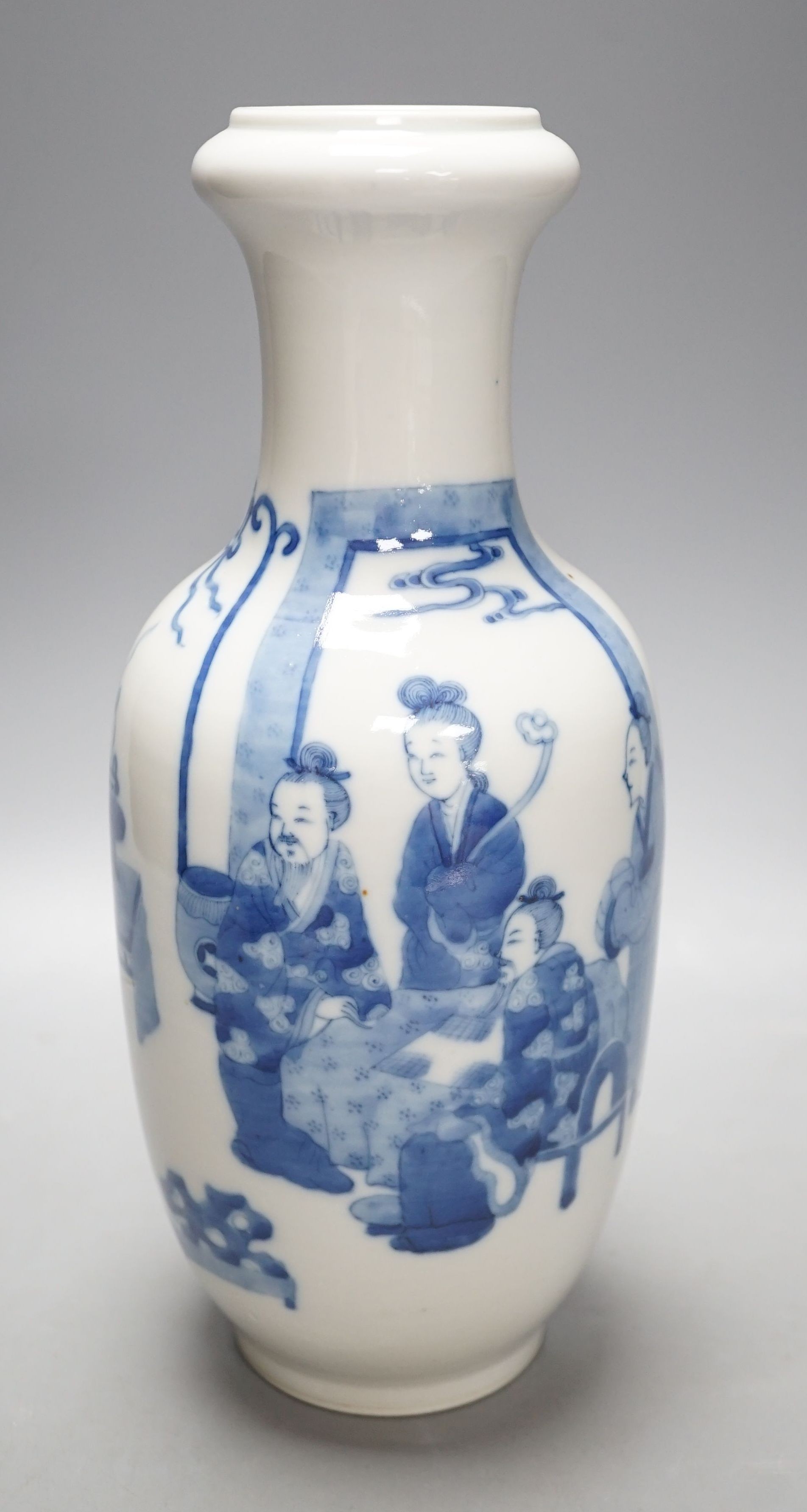 A Chinese blue and white ‘sages’ vase, 27 cms high.